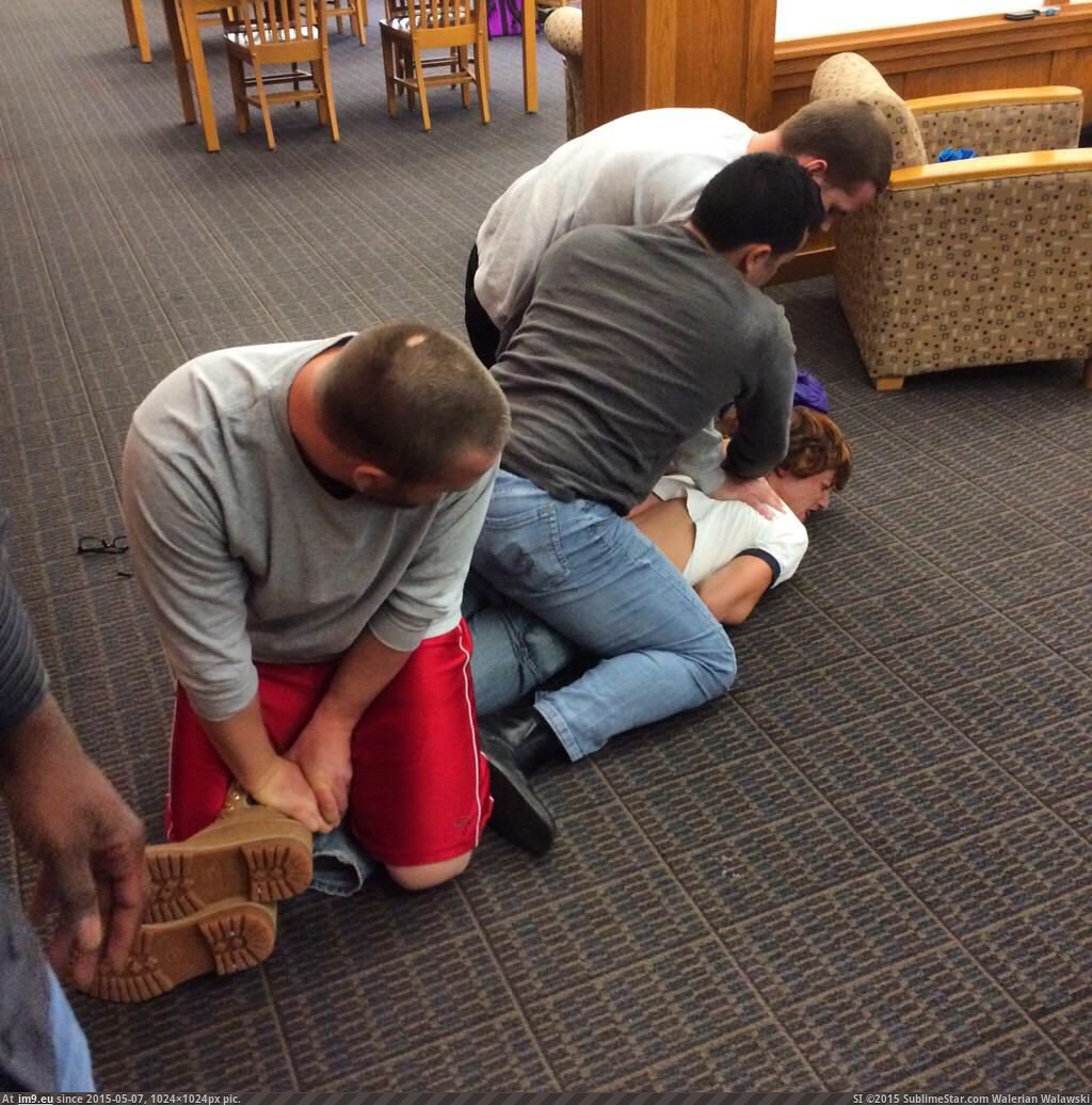 [Pics] Three students at UNOmaha subdue another student after he pulls out a knife in the school library. (in My r/PICS favs)
