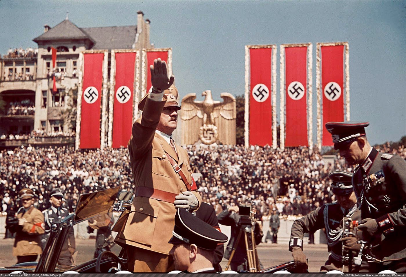 Adolf Hitler salutes troops of the Condor Legion who fought alongside Spanish Nationalists in the Spanish Civil War, during a ra (in Restored Photos of Nazi Germany)