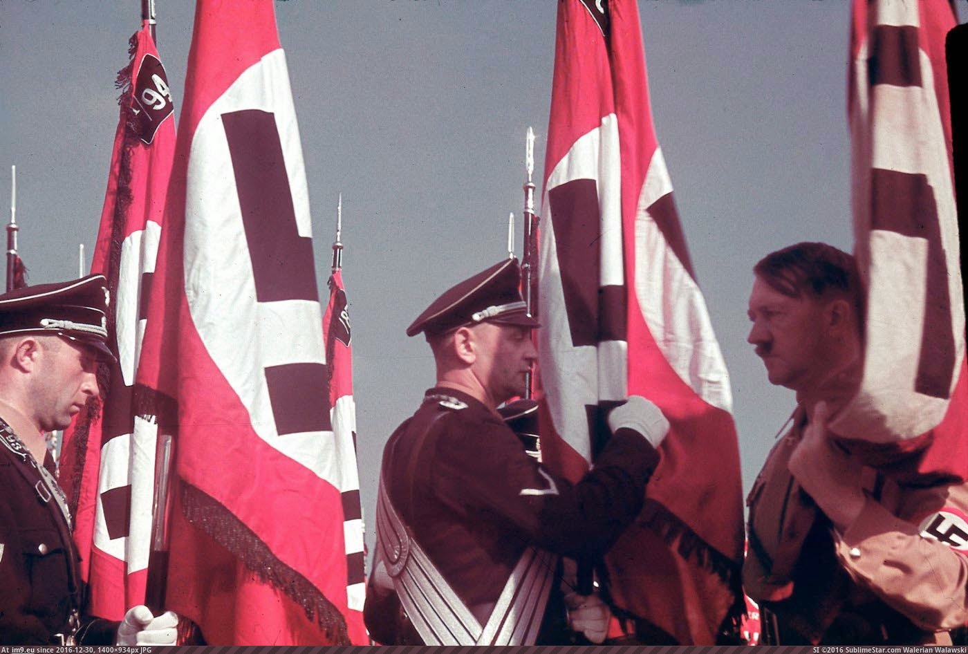 Nuremberg, 1938 (Adolf Hitler at the swearing-in of SS standard bearers at the Reich Party Congress, Nuremberg.) (in Restored Photos of Nazi Germany)