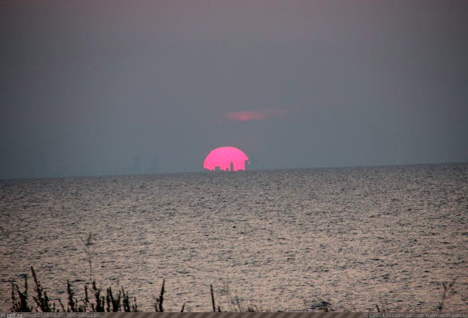 [Pics] Sunset over Lake Michigan August 7. the silhouette of Chicago inside the sun (in My r/PICS favs)