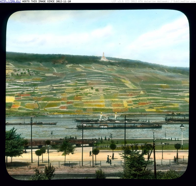 Rhine River Valley - barges on the Rhine, with the Niederwald Monument in the distance (1930).1764 (in Branson DeCou Stock Images)